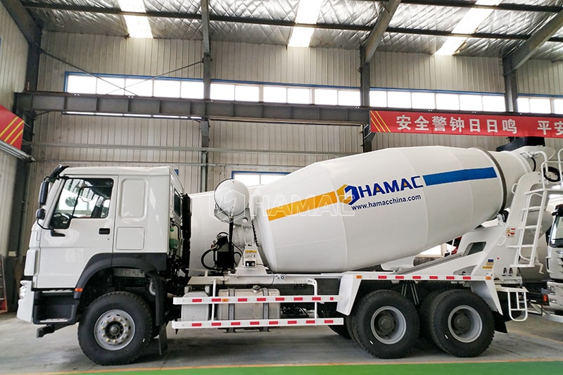 Concrete transportation by concrete mixer truck photo