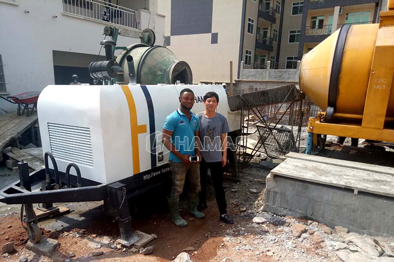 Diesel concrete mixer works together with trailer concrete pump photo