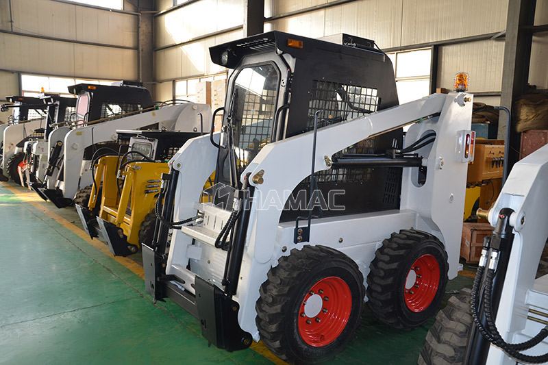 Application de chargeuse compacte en domaine de construction photo